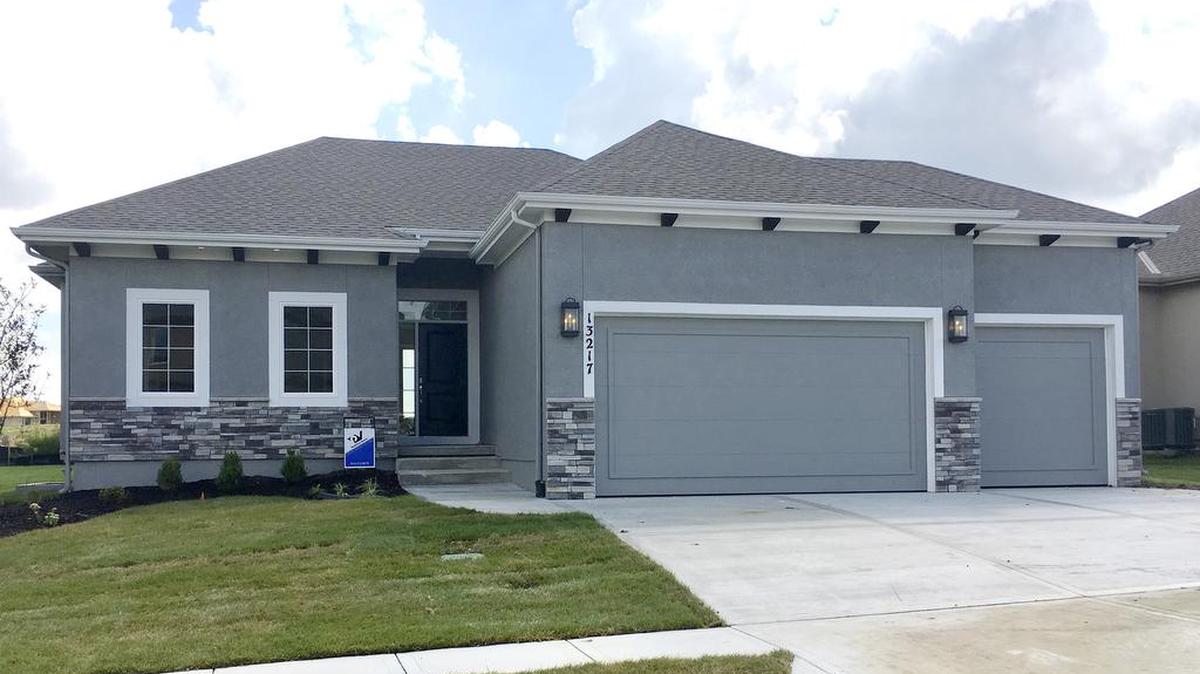 Parkview Homes’ Westbrook reverse 1½-story, located at 13217 W. 171st St., backs to future phase IV green space. The home features a covered patio, a white enameled kitchen, four bedrooms and 30-day delivery, priced at $418,643.