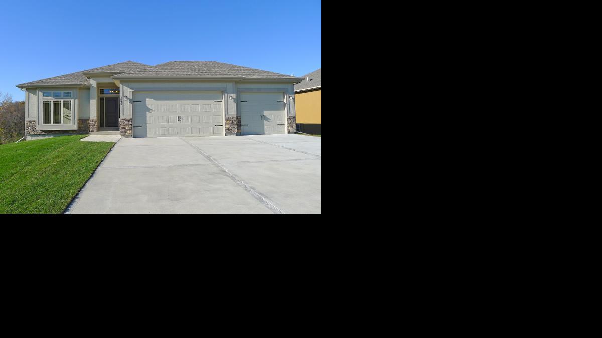 
The new model office in Parkway Village at 7908 N. Walrond Ave. is a 2,800-square-foot reverse ranch plan by GC Construction offering four bedrooms and three bathrooms.

