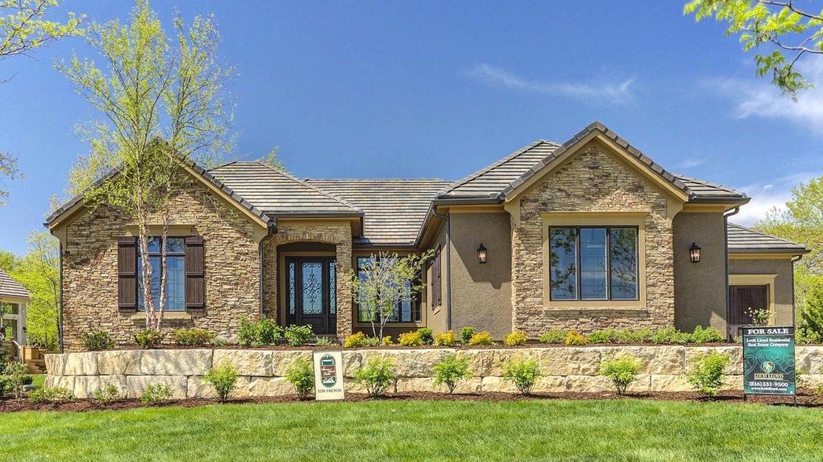 
During an open house today at this home by Tom French Construction in the Village of Loch Lloyd, visitors will be able to meet the builders, Tom and Gayle French. 
