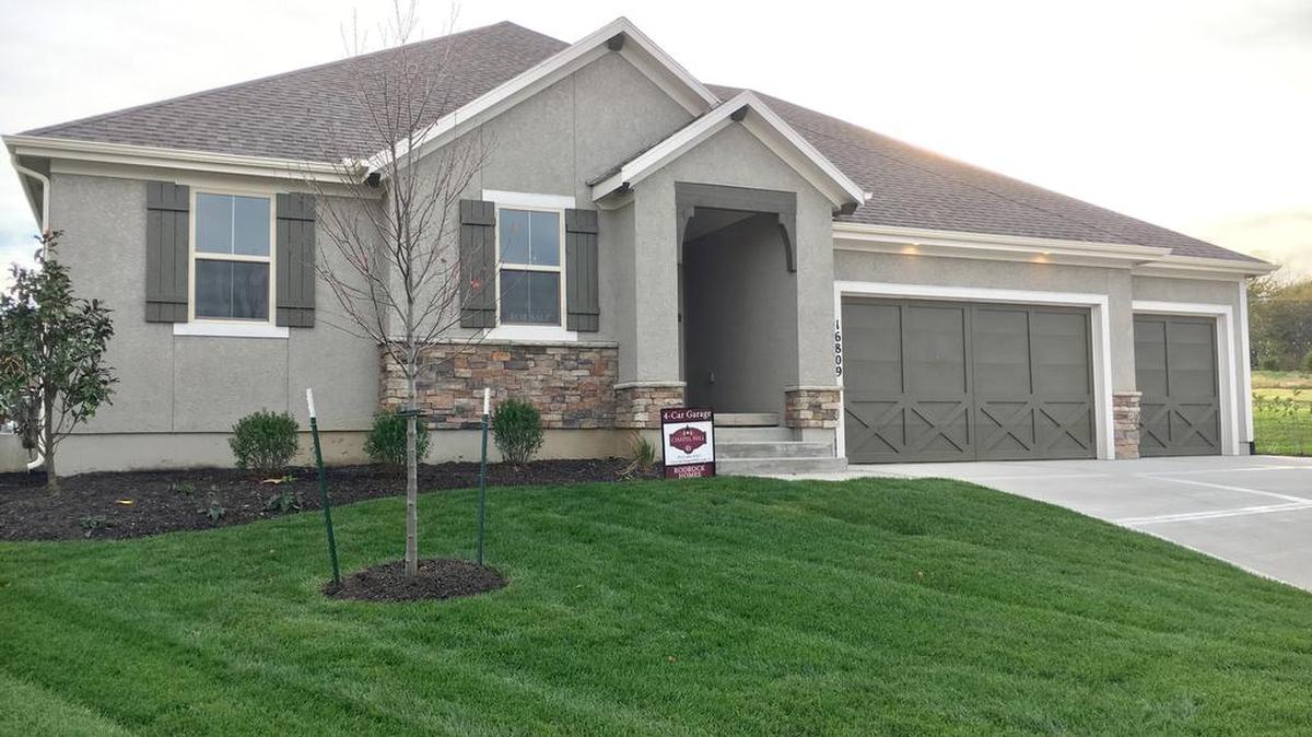 Rodrock Homes’ Augusta Ranch reverse offers three bedrooms on the main level, a 4-car garage and an enclosed covered patio. Located at 16809 Haskins, the home is priced at $468,750 with 30-day possession available.