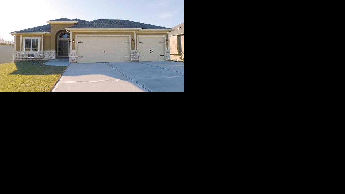 
The new model home in Parkway Village at 7844 N. Walrond Ave. is a new 2,800-square-foot reverse ranch plan by GC Construction offering four bedrooms and three bathrooms.
