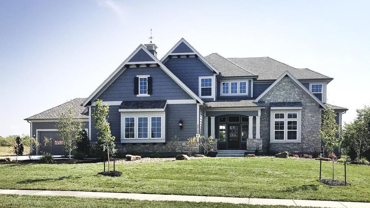 This stately reverse 1½-story home from James Engle Custom Homes is one of several Fall Parade of Homes entries in Cedar Creek’s Hidden Lake Estates. The home is located at 25123 W. 105th Terrace and priced at $982,130.