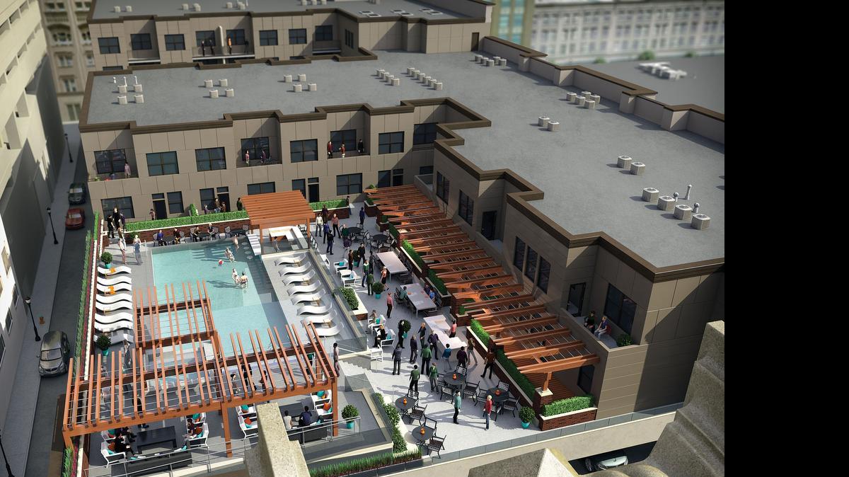 
This rendering of the rooftop pool at the Power & Light Apartments is just one example of the amenities offered to those who choose to live downtown.
