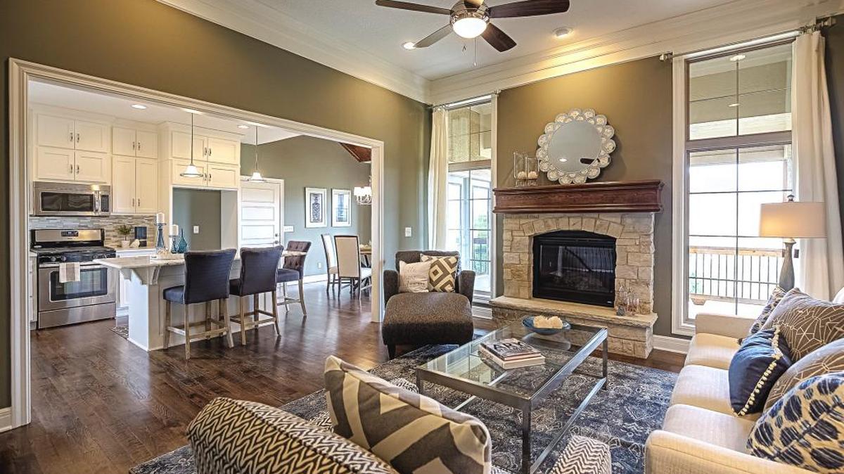 The very popular Leabrooke floor plan, a Parade of Homes Award winner, boasts a kitchen island, wood treated ceiling in breakfast room, stone fireplace with hearth, laundry room and huge master suite.