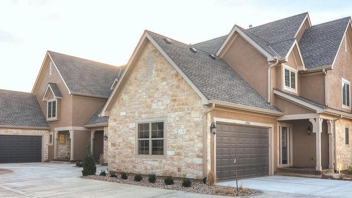 Full stucco and stone exterior brings out the cottage-like feel of the community. A 50-year roof and extra-wide 6-inch gutters will help maintain the longevity and beauty of each home.