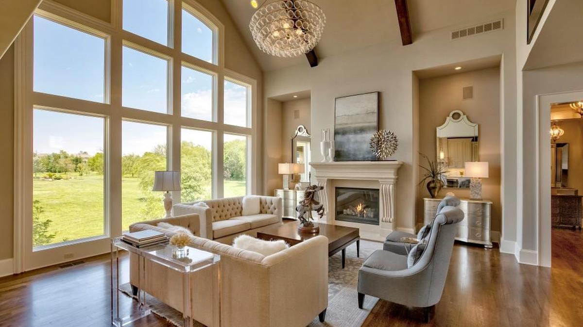 The Raphael is a grand estate home, massive in size and luxurious in features. The main level is welcoming with an impressive great room with a window wall, vaulted ceiling and fireplace. The Raphael is available for immediate purchase in Summerwood Estates in Overland Park.