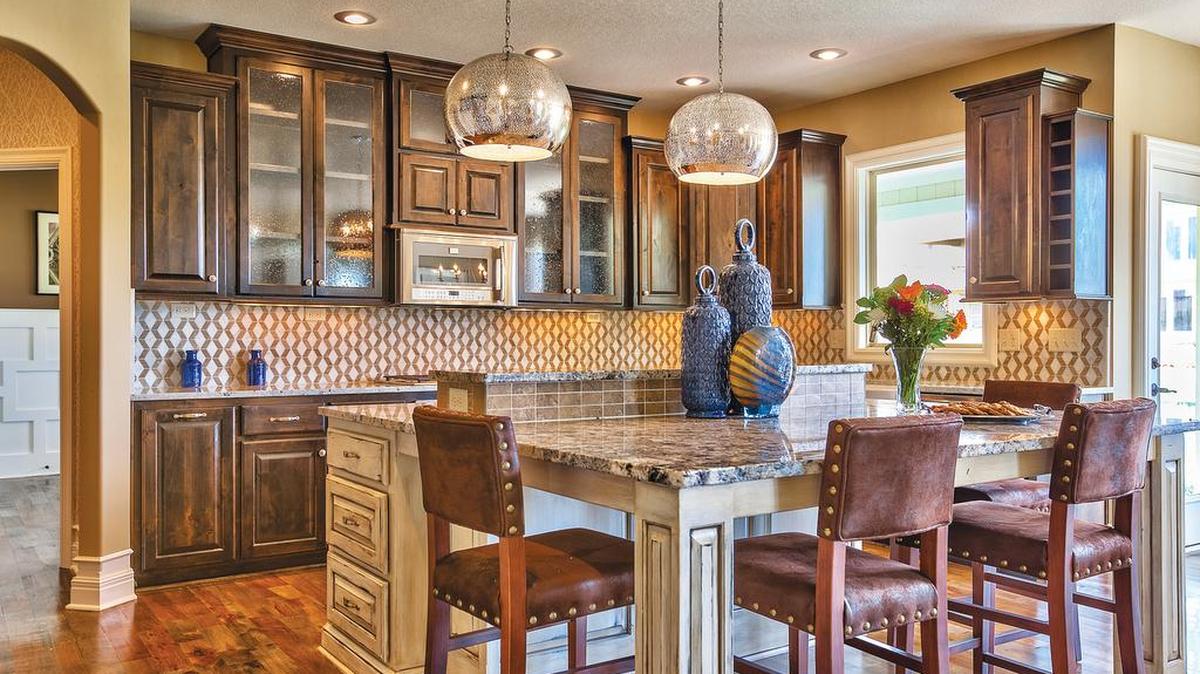 
The Lancaster 4.5 is the latest variation of Rodrock Homes’ popular Lancaster family of floor plans. The gourmet kitchen with an oversized granite-topped island is perfect for weeknight meals, after-school snacks and homework.

