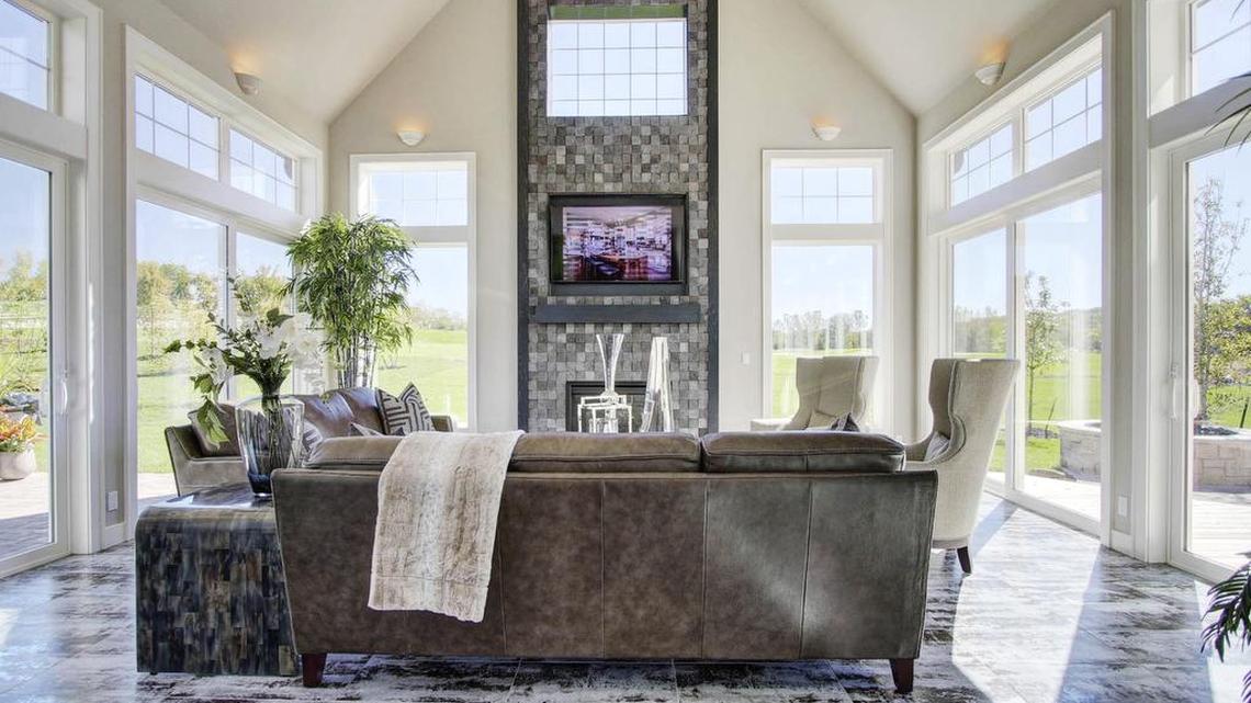 Don Julian Builders’ 1½-story home takes full advantage of a stunning location with panoramic golf views from the home’s four seasons room. Tour the home today, one of three Loch Lloyd homes featured on the Fall Parade of Homes.