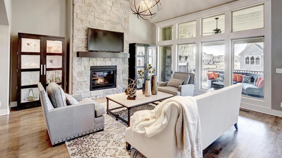 Allure Luxury Homes’ Spring Parade entry, located at 2401 W. 146th St. at The Villas of Leabrooke Town Manor in Leawood, boasts a stunning floor-to-ceiling stone fireplace, vaulted ceilings and large windows that provide an abundance of natural light.