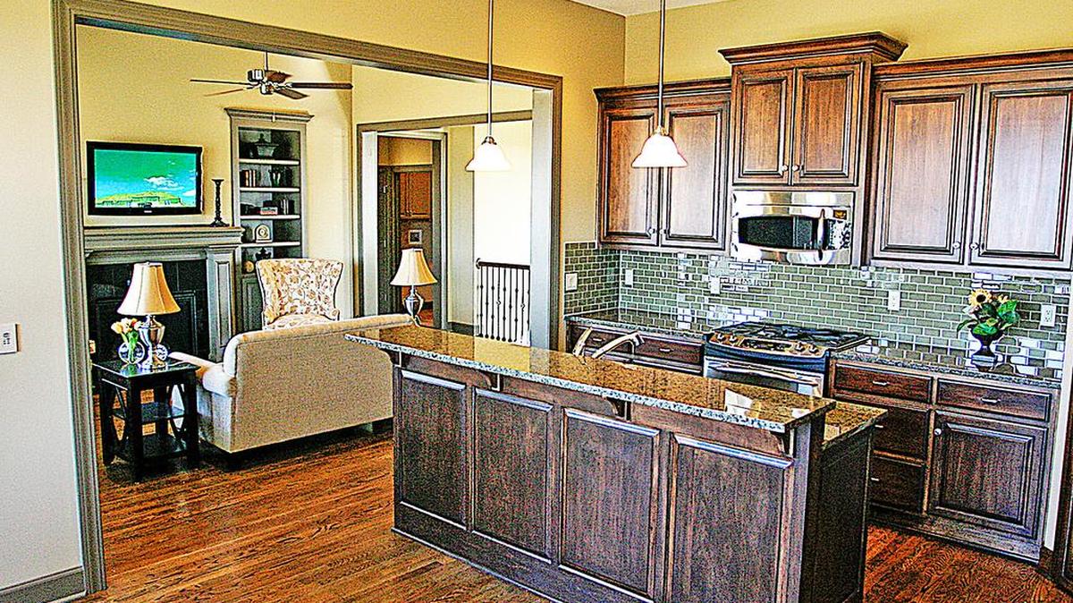 
The Lime Stone Road Townhomes at The National have open interiors that emphasize main-floor living with the great room, kitchen and master suite on one level.
