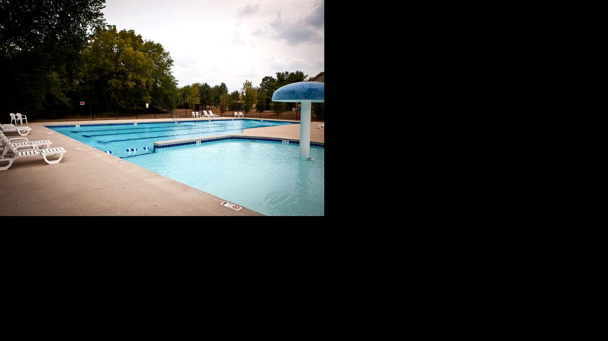 Among the amenities at Legacy Wood are a Junior Olympic-size pool large enough for the homeowners association to form a competitive swim team and a zero-entry kiddy pool with interactive bubble water feature and large mushroom umbrella waterfall.