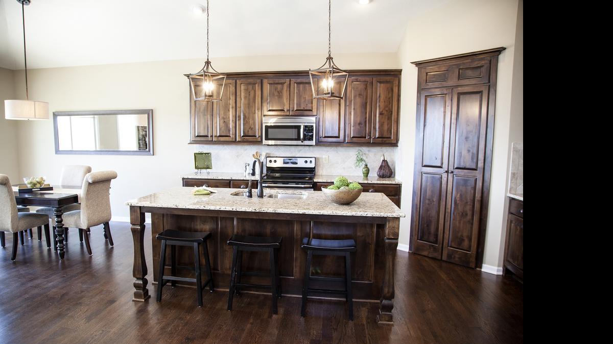 
Brookwood Farms has two new furnished models, a reverse 1
1/2-story plan and a two-story design. 
