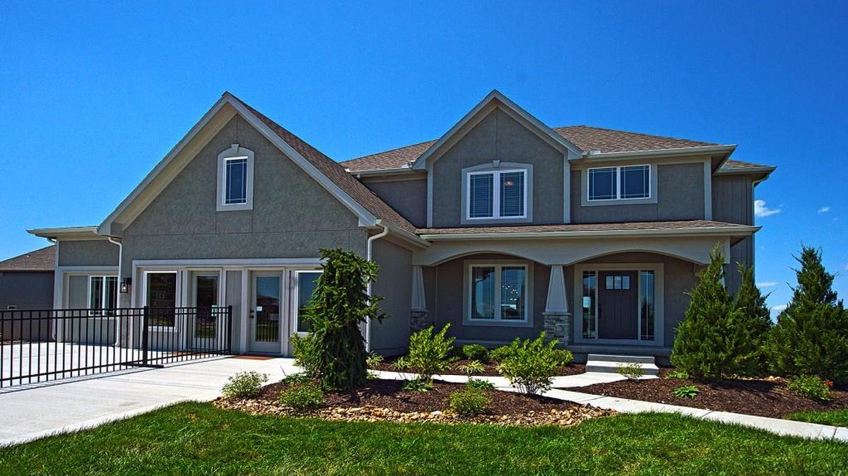 In Rodrock Development’s Arbor Lakes, “We have homes priced from just under $400,000 to $460,000s,” says Ann Knickrehm, a Rodrock Development marketing agent of more than 20 years. That includes three two-story plans with flex rooms by Rob Washam Homes, including this model, The Reilly III.