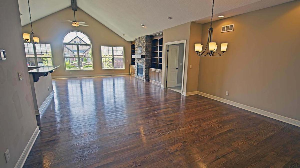 The Cottages at Woodridge’s ranch-style homes feature elegant arched entryways and windows, cathedral ceilings, extra-wide doorways, two-car garages, and solariums opening onto beautiful patios.
