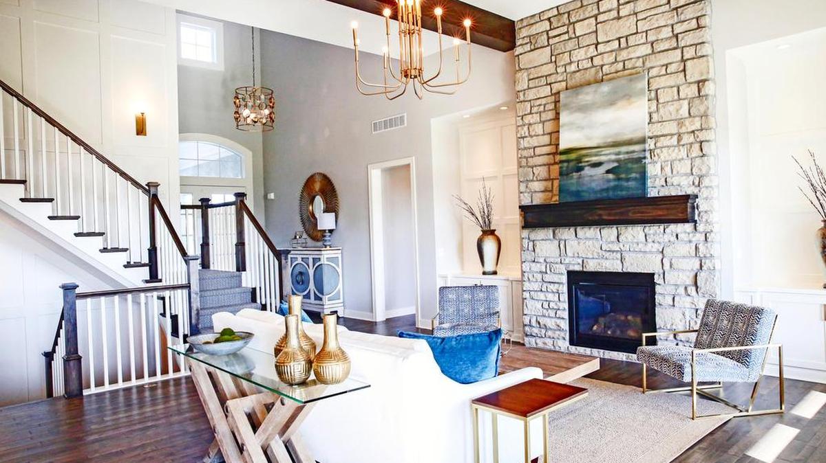 Rodrock Development received a bountiful harvest of 13 outstanding wins in the 2018 Fall Parade of Homes. Among them was The Mill at Riverstone’s Windermere by BCI-Bowen Custom Homes, which earned First for Distinctive Plan and Design. This beautiful 1.5 story has a soaring 2-story entry opening to a spacious Great Room complete with wall of windows.