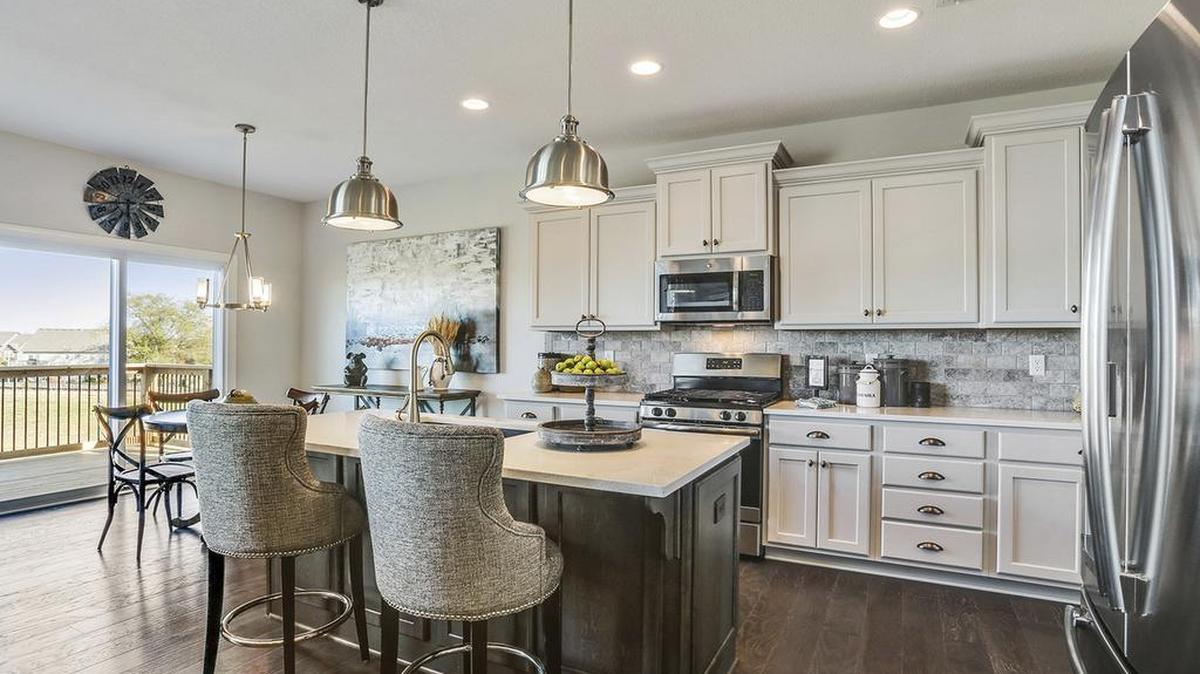 As the Fall Parade of Homes continues through Oct. 7, prospective buyers are invited to experience the charming warmth of Huntford in Olathe. “There’s a different feel here—everyone wants to meet their neighbors,” said Maria Bolyard.