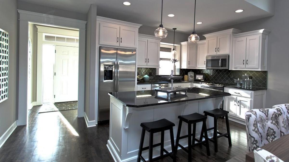 Buyers at the Villas of Tiffany Woods typically are moving from large well-built homes and don’t want to trade luxury and quality to downsize, says Liz Powell, who markets the property for Green Spire Real Estate.