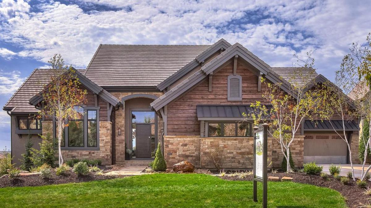
Built by Rodrock Homes for the Artisan Home Tour, this award-winning, striking modern mountain-inspired home defines rustic luxury and elegance by incorporating innovative use of natural hand-selected materials, including native stone, reclaimed wood, glass, metal and iron.
