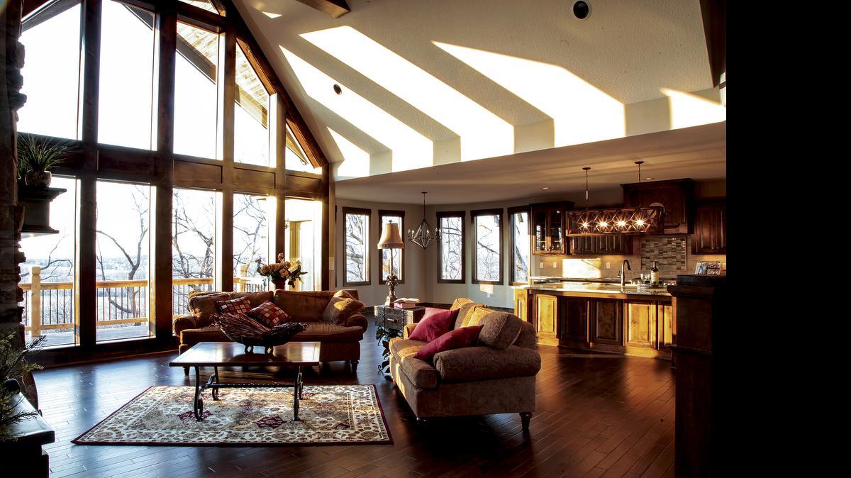 
This home in the Enclave of Sunset Hills in the Communities of River Ridge has the feel of living in a treehouse because of the slope of the home site. All homes have exceptional views.

