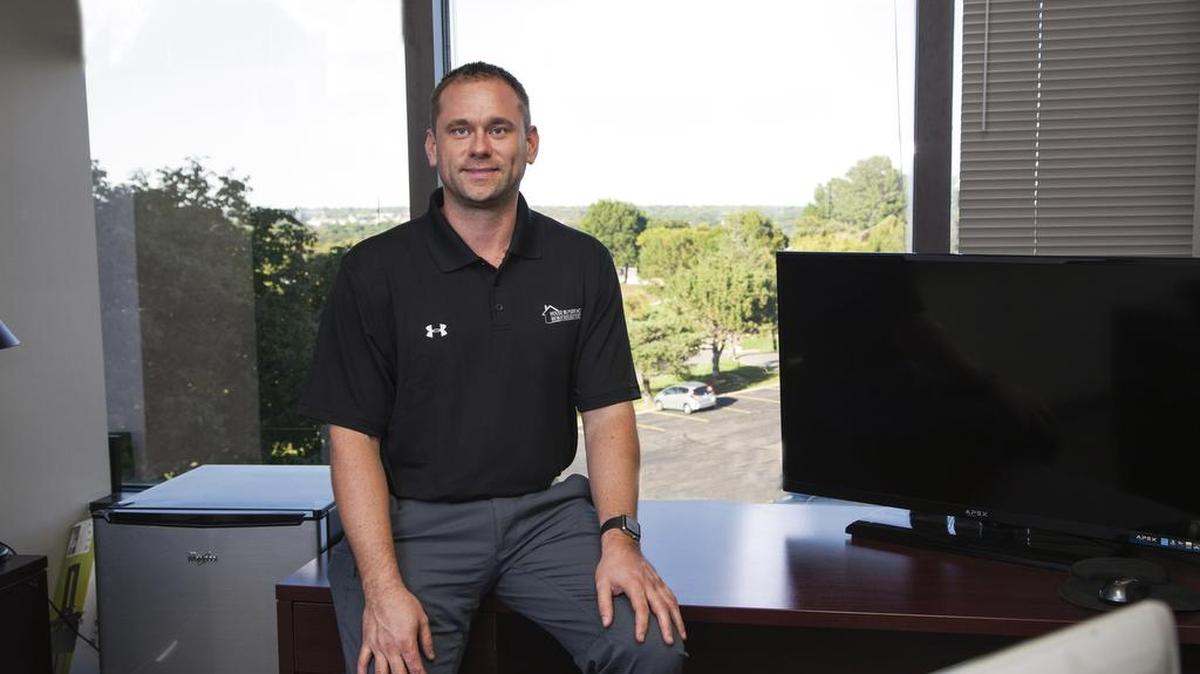 Chad Lower, manager of House Buyers KC, buys homes in need of repairs and updating, which are then renovated and resold.