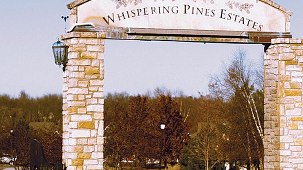 
The entry monument welcomes visitors to Whispering Pines Estates  in Kansas City, Kan., an Inspired Homes community where home sites are now for sale.
