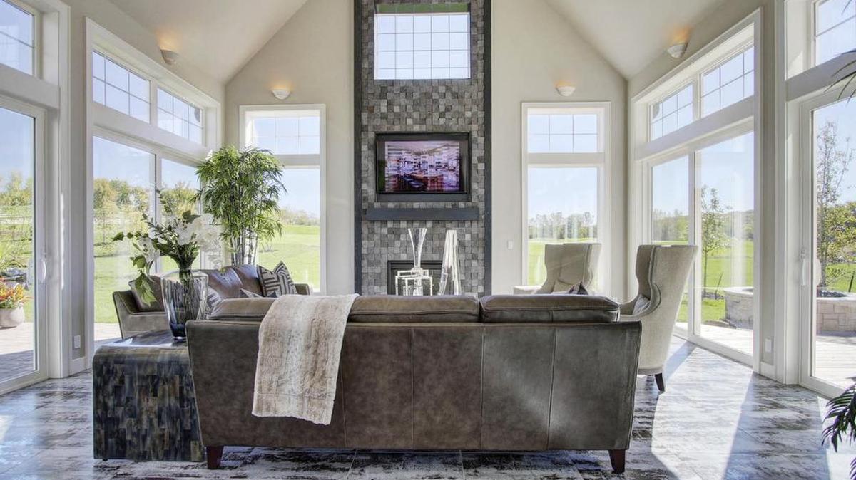 Don Julian Builders’ 1½-story home takes full advantage of a stunning location with panoramic golf views from the home’s four seasons room. Tour the home today, one of three Loch Lloyd homes featured on the Fall Parade of Homes.