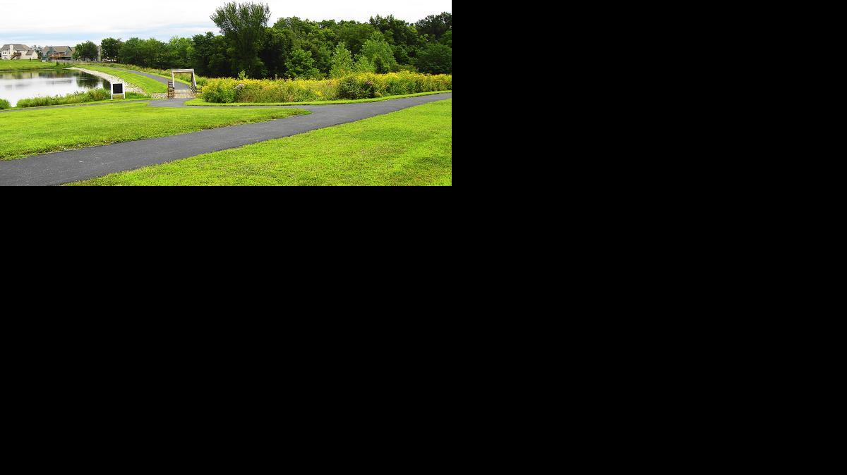 
This trail winds over the bridge across the lake at Harbor Lake, a Porter community in Smithville.
