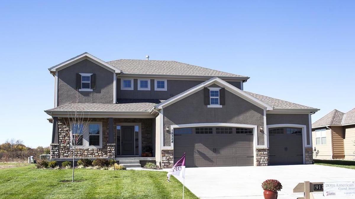 
This Savannah two-story plan in the Estates of Wolf Creek offers four bedrooms, 3
1/2 bathrooms, a first-floor office and oversized covered deck. It is available for $369,000.
