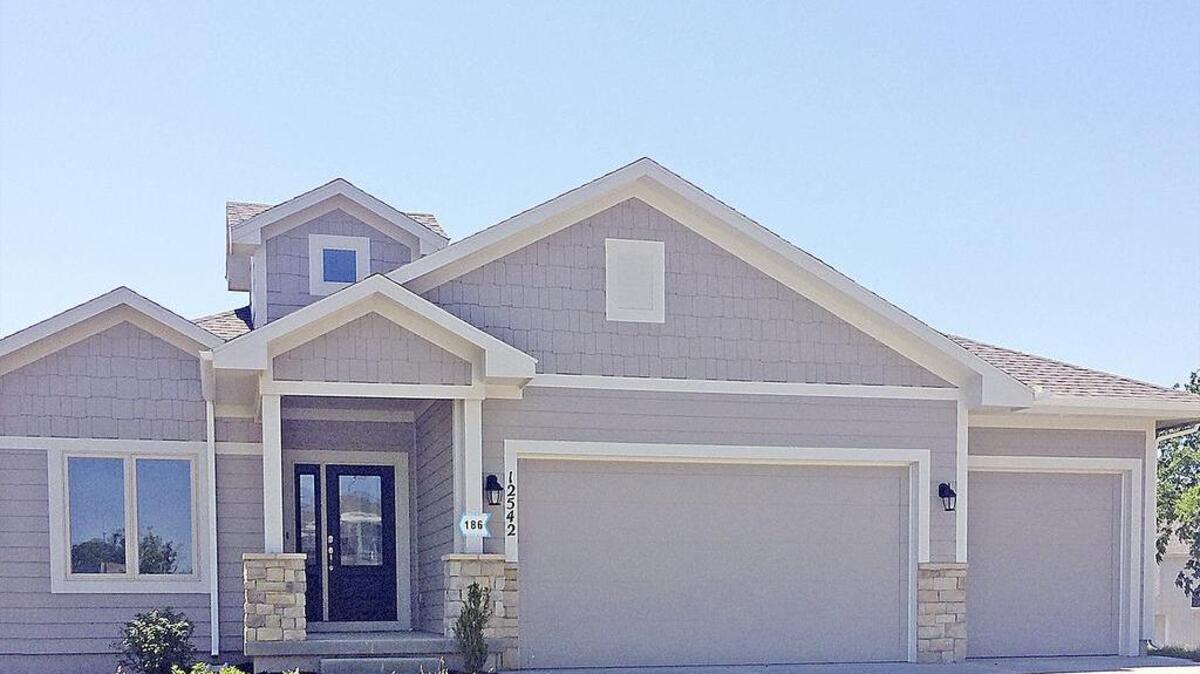 The impressive Marco IV reverse 1.5 story is ready for an immediate buyer in Rodrock Development's fantastic Arbor Woods community, located at Canyon Drive and 125th Terrace. Arbor Woods is within walking distance to Forest View Elementary, feeds into Mission Trail Middle School, and is located close to the new Olathe West High School — opening this fall.