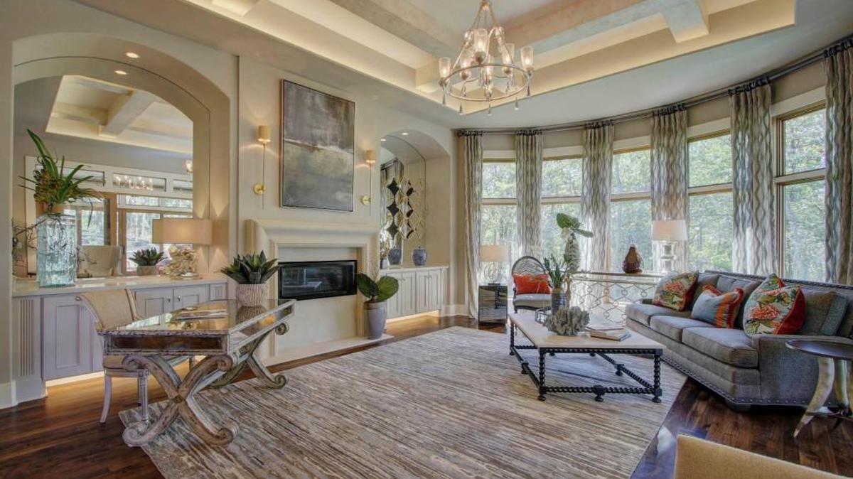 Bow windows and numerous mirrors combine to create an airy, light-filled interior accented by luxurious finishing touches, the work of Loch Lloyd builder Willis Custom Homes. Tour the home, located at 100 Dunhill Ct., as the Spring Parade of Homes continues.