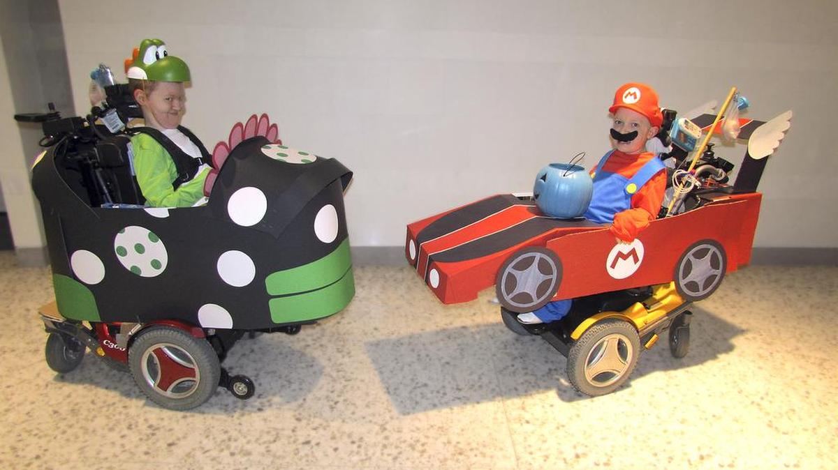Winners of the Cutest Kid Halloween Photo Contest were Hunter dressed as Yoshi, driving the Piranha Prowler Mario Kart, while his brother Cody dressed as Mario, driving the Wild Wing Mario Kart.