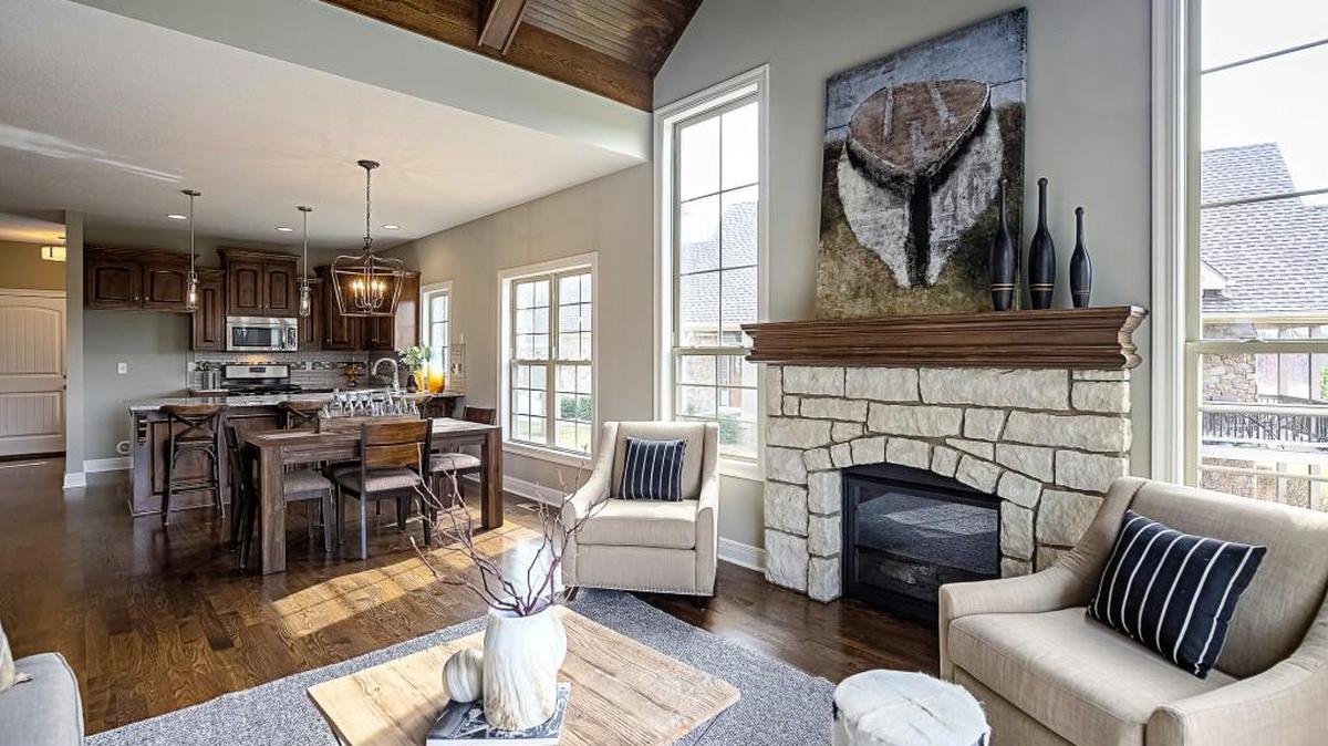 The Mayfair floor plan boasts large windows providing a tremendous amount of natural light, a wood vaulted ceiling and a generous breakfast bar.