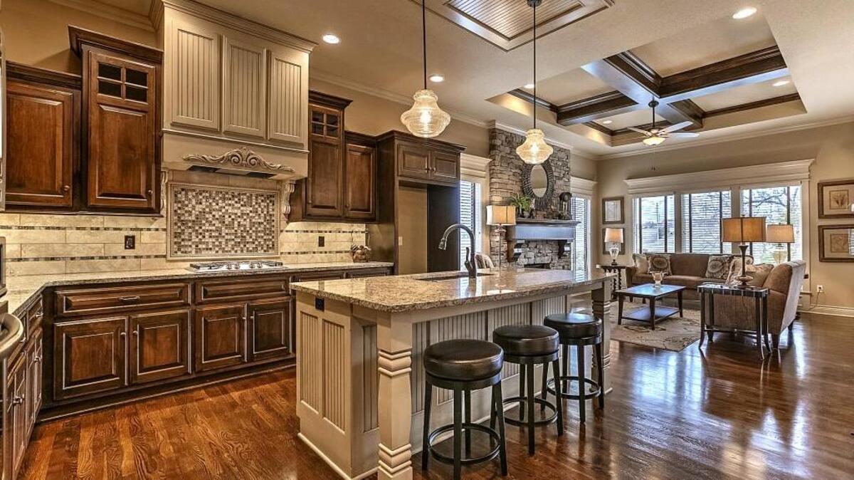 Custom cabinetry, granite countertops and hardwood floors are among the luxurious finishes featured in Gatewood Villas’ gourmet kitchens.