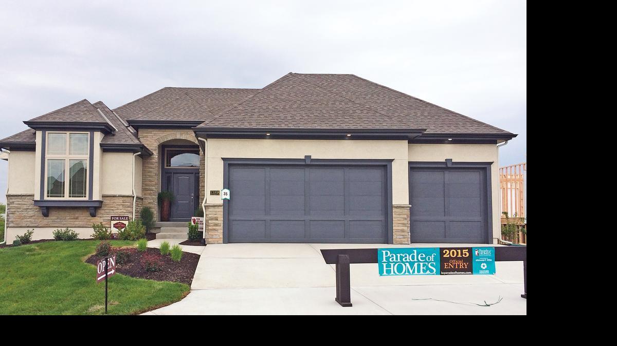 
Don Julian Builders’ newest model home for sale is the Wyndham reverse 1
1/2-story at 13208 W. 170th St. It features a walkout basement, covered deck, four bedrooms, three bathrooms, a three-car garage and backs to the timbered green space and walking trail. It is priced at $509,900.
