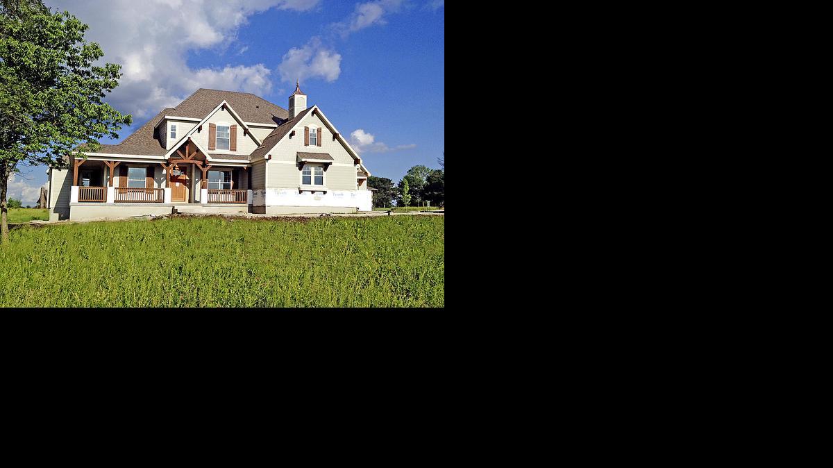 
This new home constructed by Todd Hill Homes in Southwick on the Lake features gleaming hardwood floors, pristine woodwork, ample natural light and a truly open floor plan.
