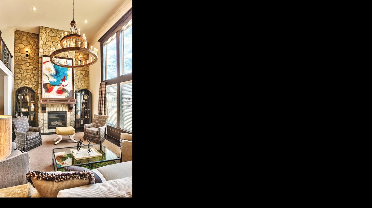 
A dramatic stone fireplace anchors the Chesapeake’s two-story great room. The two-story, four-bedroom, 4
1/2-bathroom floor plan is available to build at Colton.
