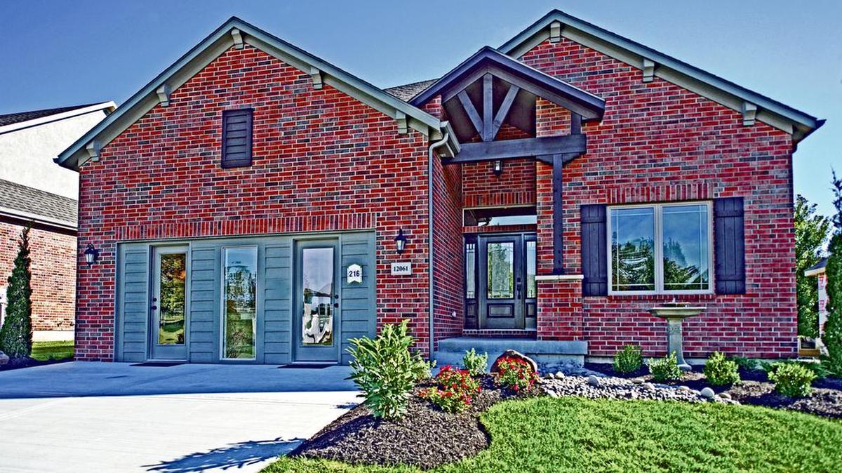 Grayson Place, found at 119th and Lone Elm Road, offers both villas and townhomes, including this all-brick home.