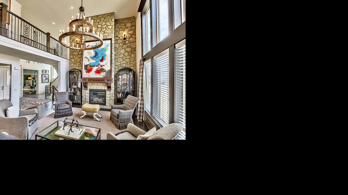 
The Chesapeake II’s two-story stone fireplace is a dramatic design element anchoring the stunning great room in Rodrock Homes’ Summerwood community. This model home is available for immediate purchase.
