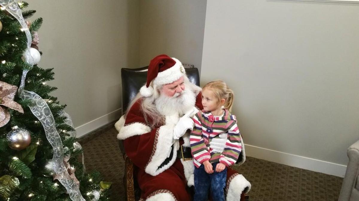 Thanks to the Rodrock Development’s Mom Council in the Forest View community, Santa visited with children in the community at the annual Christmas hayride and caroling event recently.