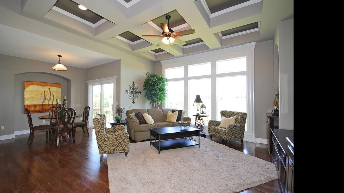 
The Catalina model by Calyn Homes at The Villas of Sunnybrook features an all-stucco exterior, elegantly coffered great room ceiling, granite counter tops and iron spindle staircase. Furnished models are now available for daily viewing.


