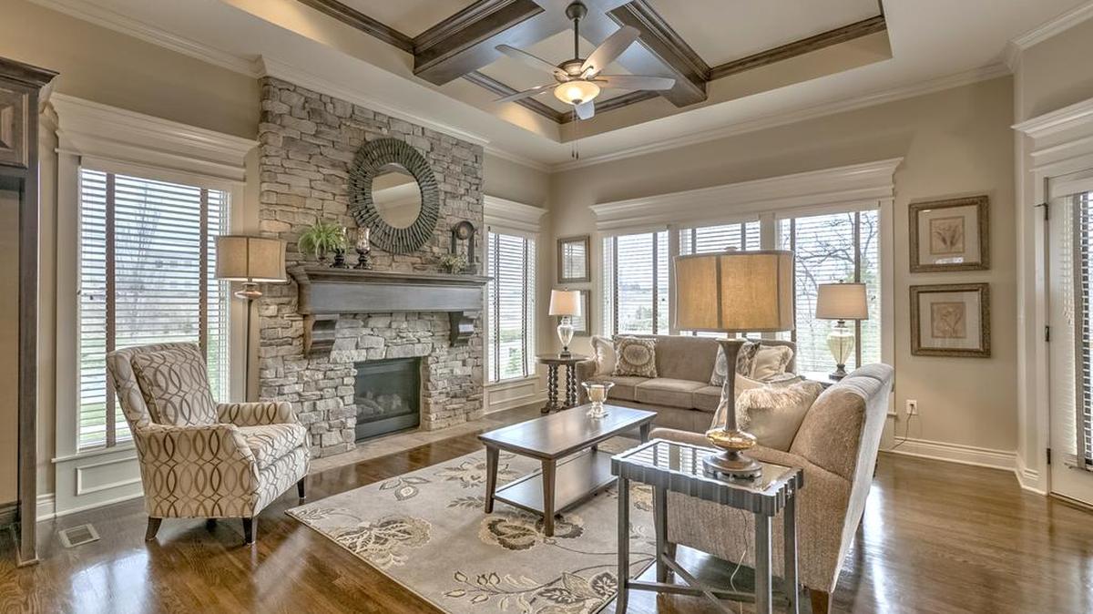 An open floor plan and rich architectural details create an inviting living space in the Woodside plan at Gatewood Villas.