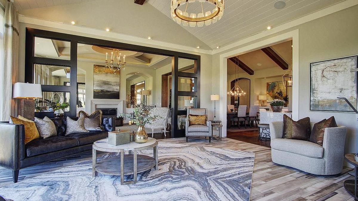 Two incredible model homes, built for the Parade of Homes, are now available for sale in Loch Lloyd. They include a reverse 1½-story home by Willis Custom Homes (pictured) at 16111 Carnoustie Lane.