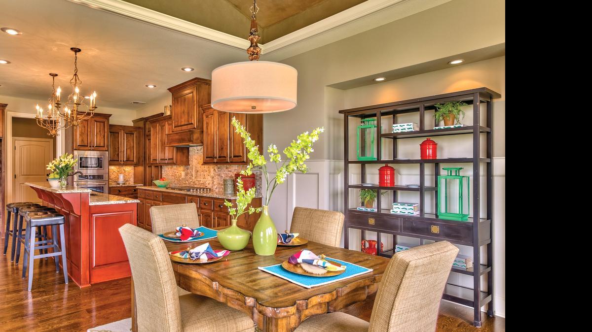 
The El Dorado is one of the newest 1
1/2-story plans by Rodrock Homes. Providing the comfort of a main-level master suite, the popular design also features a dining room connected to a gourmet kitchen. 
