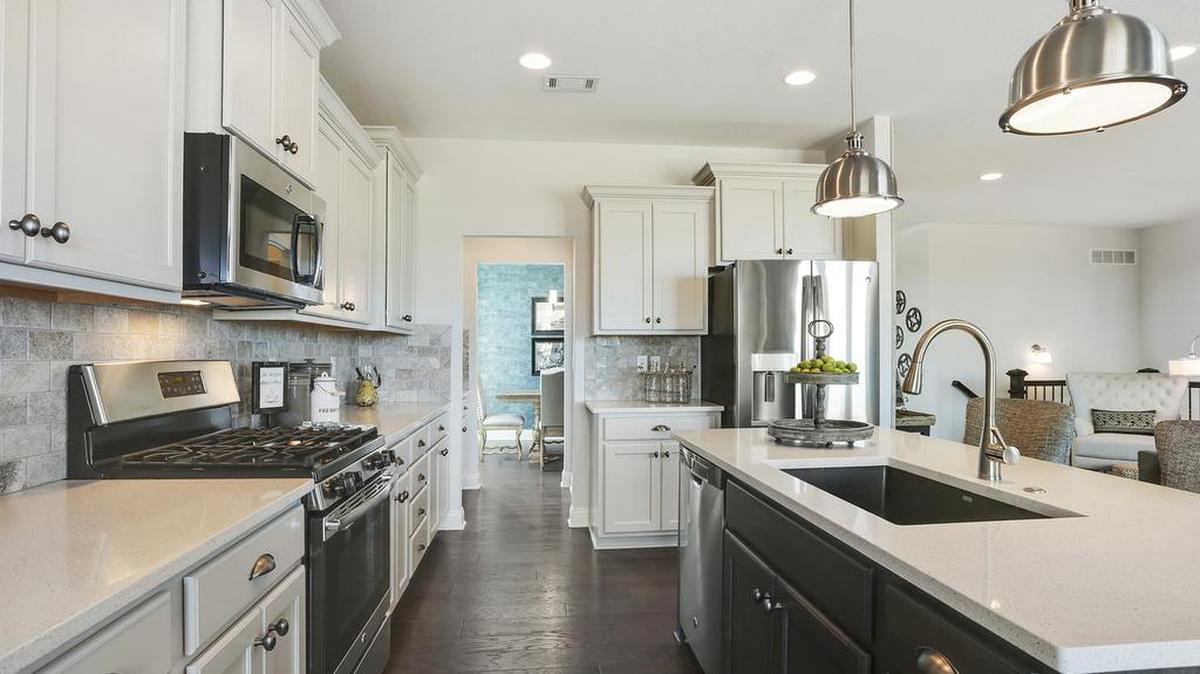 Julie English and her husband, Joel English, Jr., were thrilled with the home they bought in The Reserve. “They [Inspired Homes] just think of everything as far as options,” Julie said.