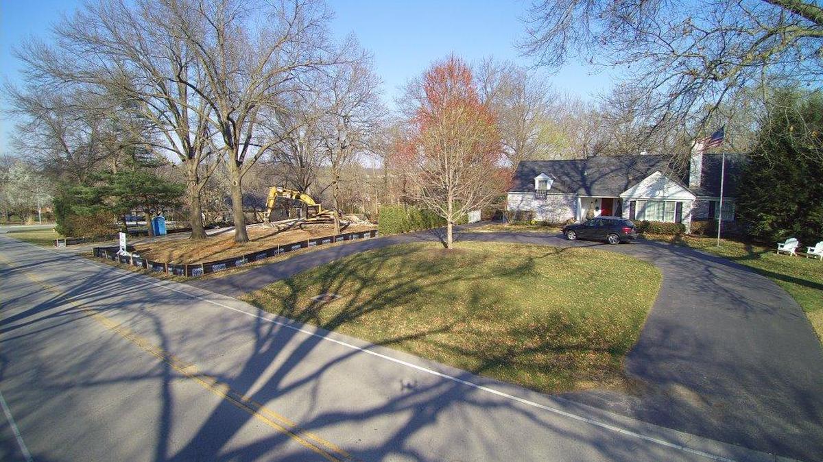 Infill homes like this one, being built by Moffitt Built, is a nationwide trend where a builder, investor or individual buys an existing home and demolishes and replaces it with a new one. The process is especially common in established suburbs where people wish to have larger homes.