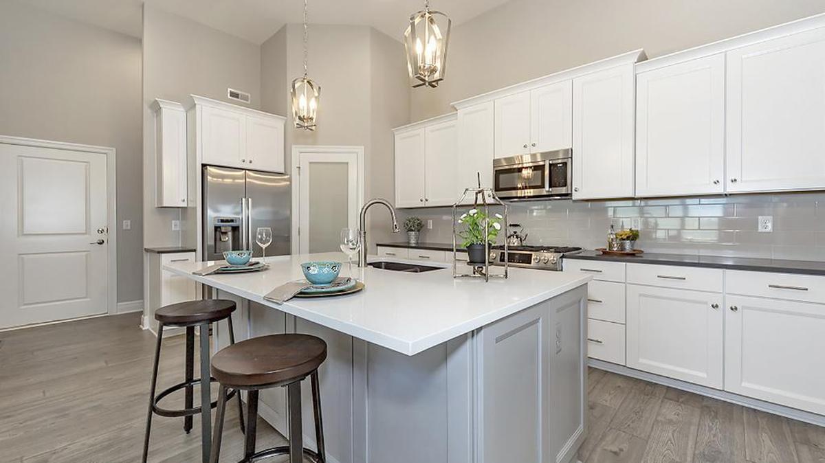 Home #284, by Dreams & Design Building, shows that you can enjoy the same level of excellence in design and materials in a townhome that you would in a single family home.
