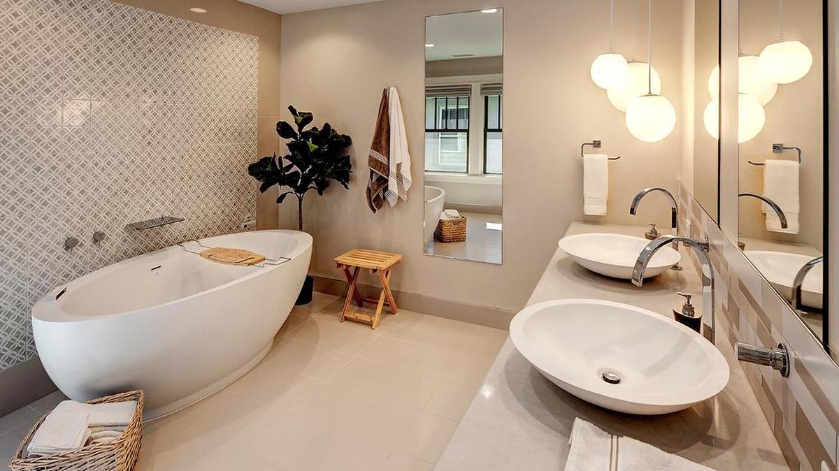 Experience how transformative a room addition and whole house interior/exterior can be when you walk through this project in home #12 by ALH Home Renovations.