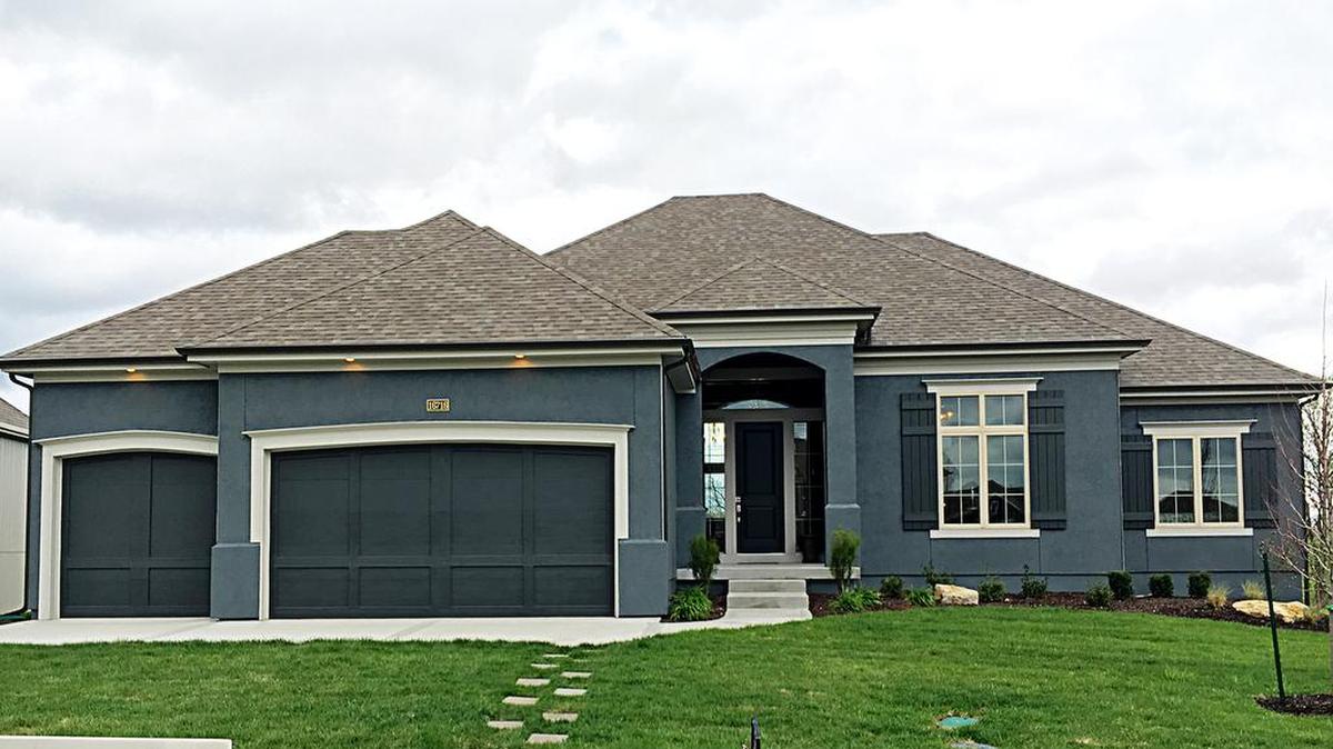 Don Julian Builders’ 2016 award-winning Brookridge II ranch reverse model home is located at 16716 Haskins and includes four bedrooms (three on the main floor), a covered deck, vaulted truss beam ceiling, designer finishes and a magnificent lower level bar area.