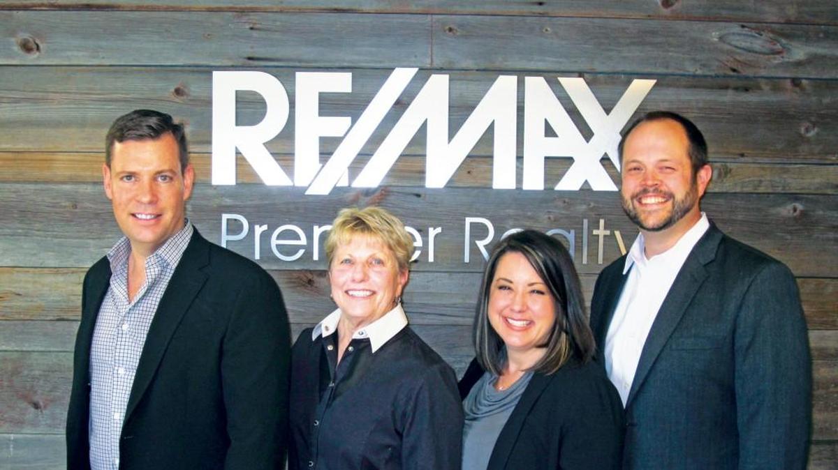 Team Mall’s Darren Taylor, Ellen Vap, Nicole Mall and Andrew Mall work with clients on both sides of the state line and in all stages of life.