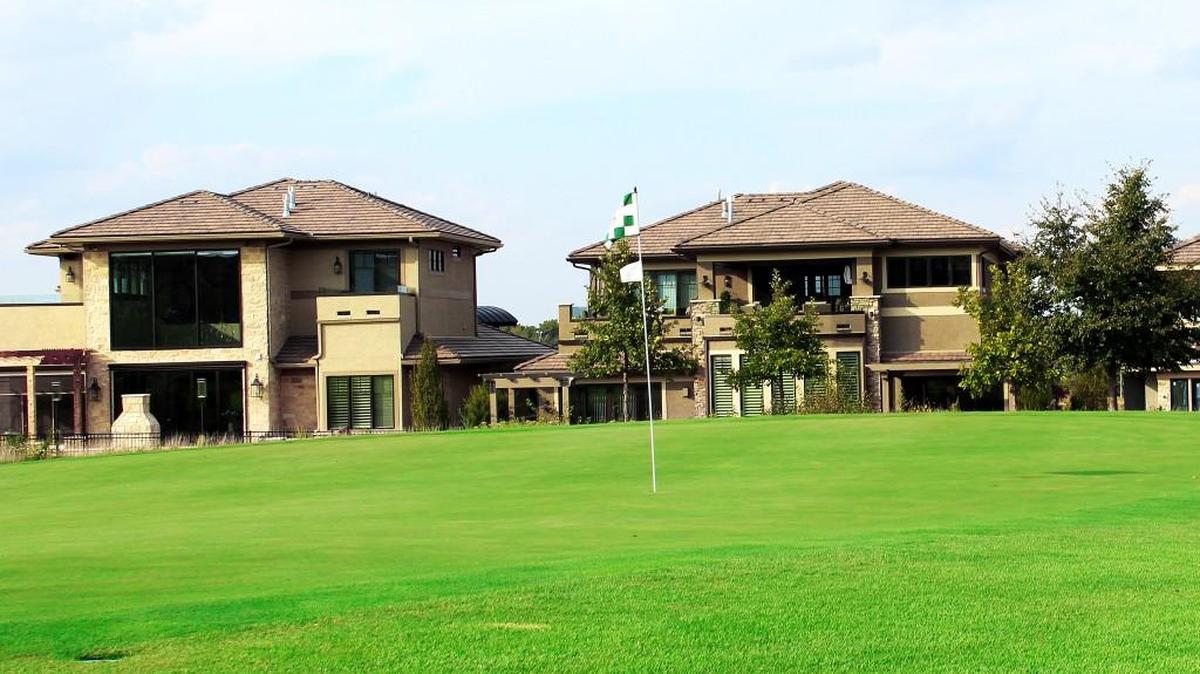 Enjoy spectacular views of the Nicklaus Golf Course at Lions Gate from your back porch at Prairiefire Villas.